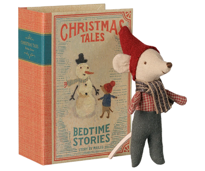 Maileg Christmas mouse beside its illustrated Christmas Tales book